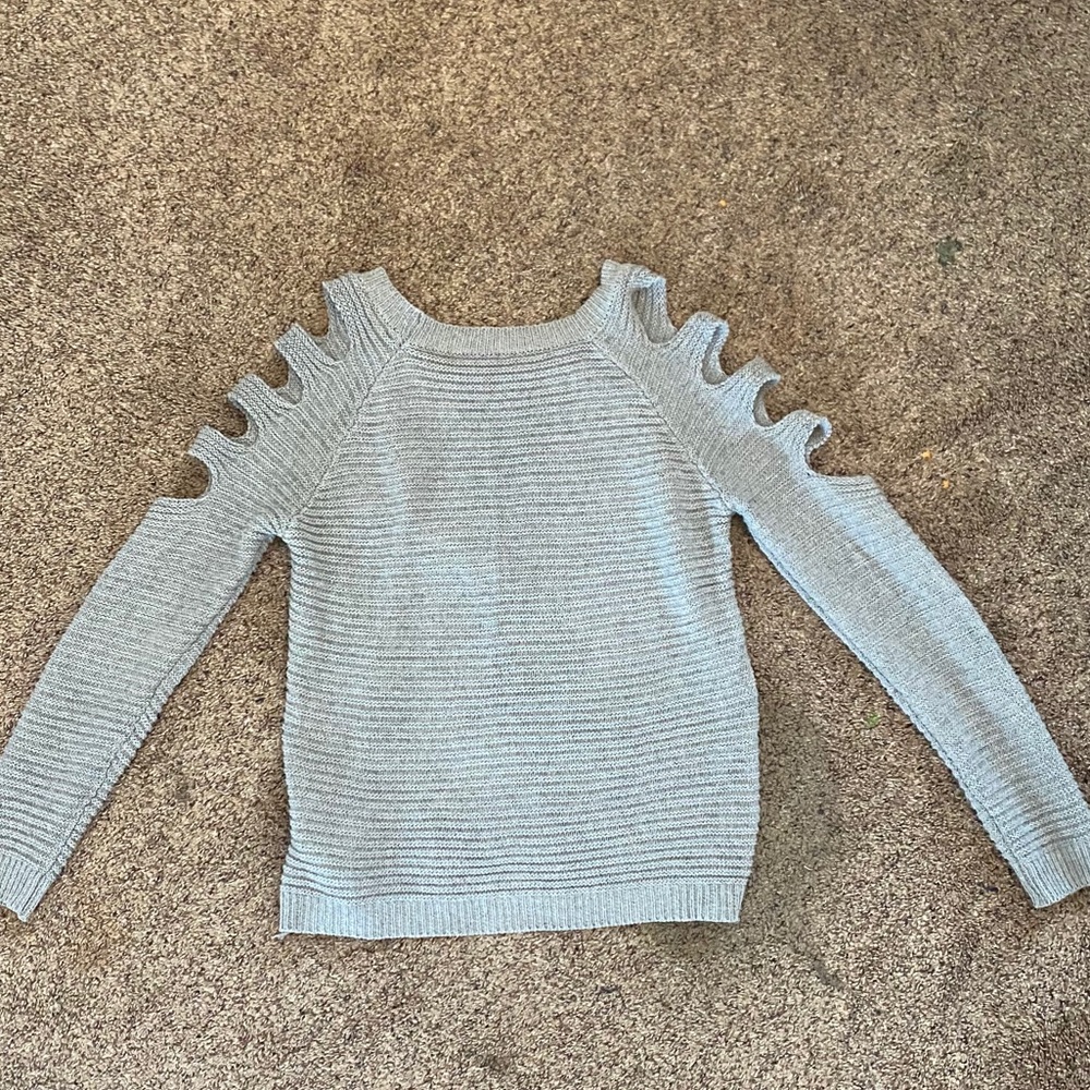 gray ripped sweater